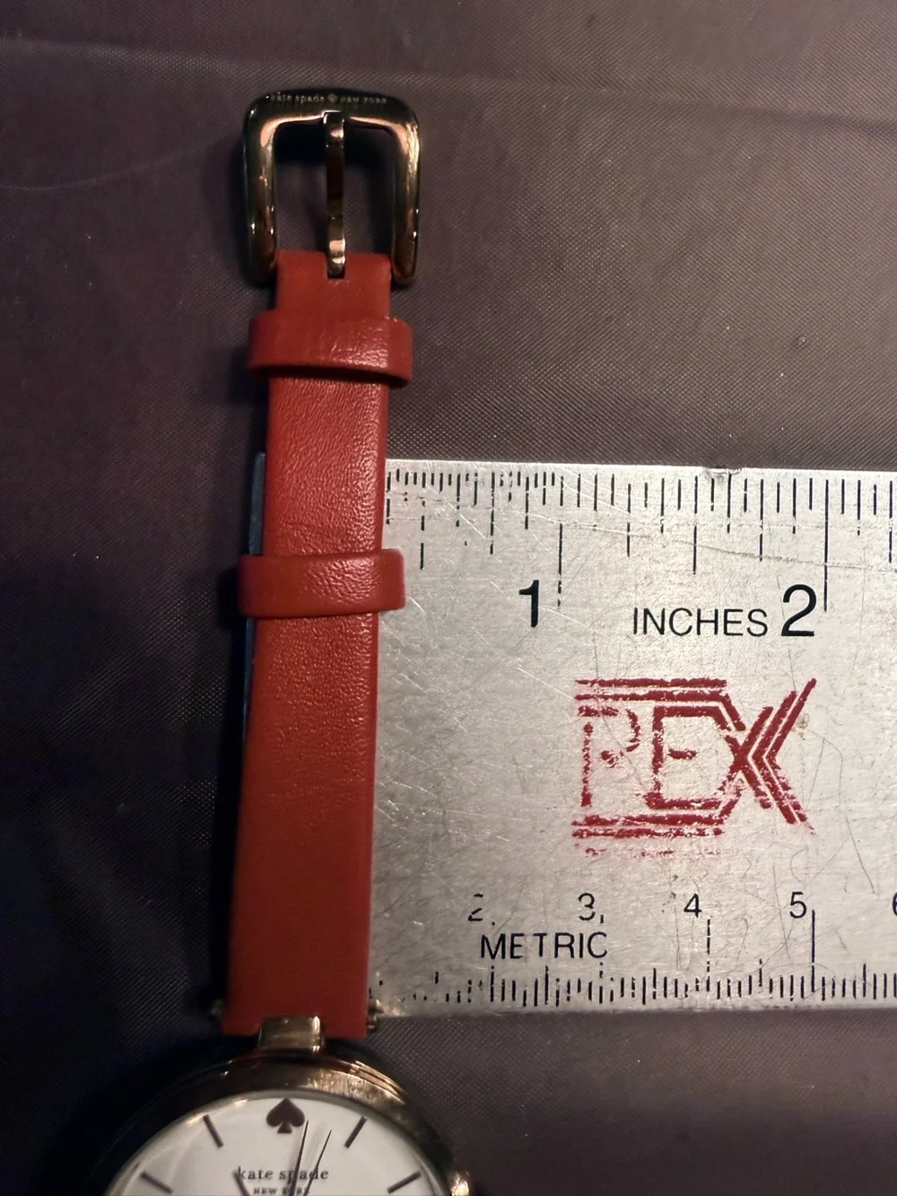 Kate Spade Holland watch rose gold-tone case and a vibrant red leather strap